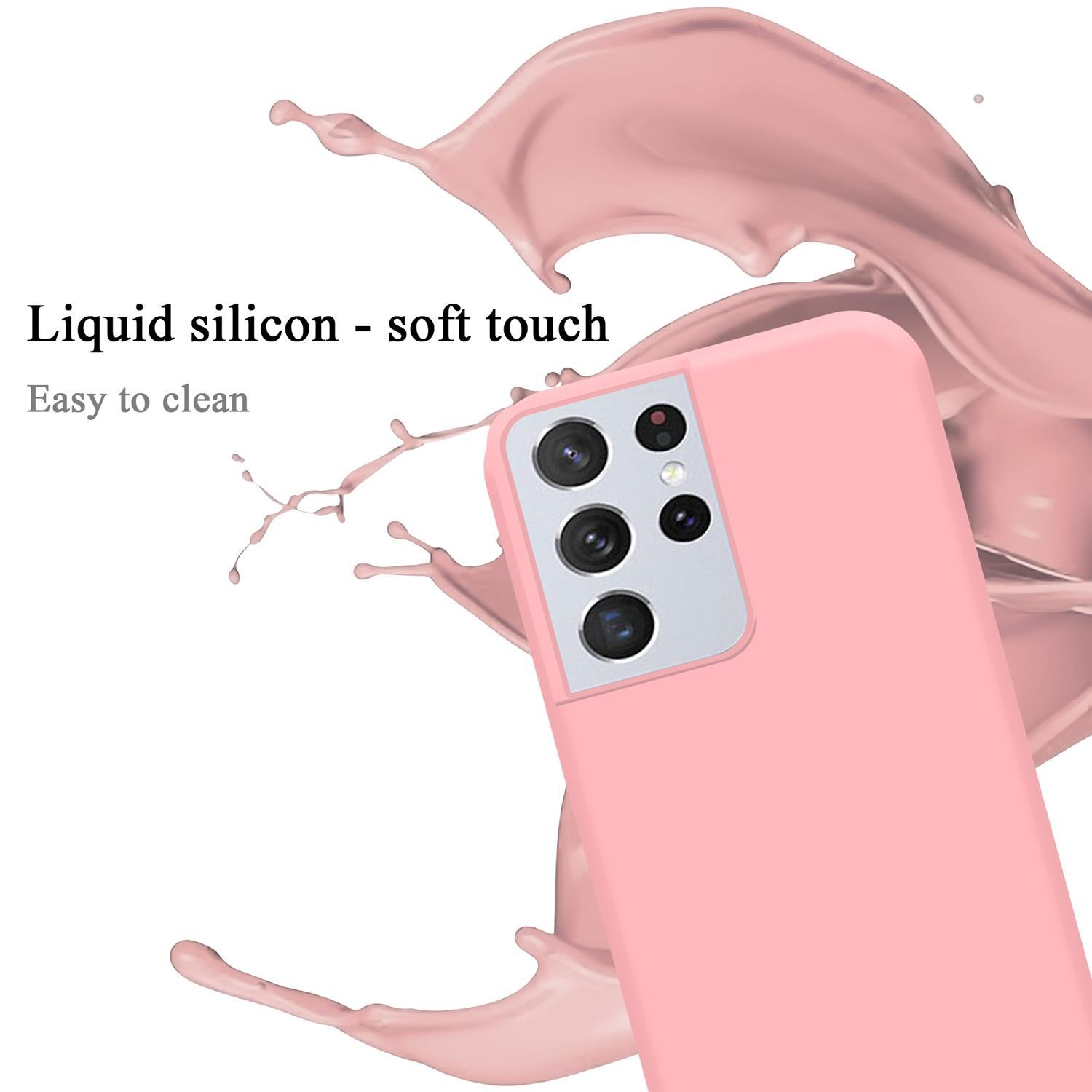 Eine rosa Handyhülle mit einem Spritzer rosa Flüssigkeit und einem Telefon mit mehreren Kameras auf weißem Hintergrund.