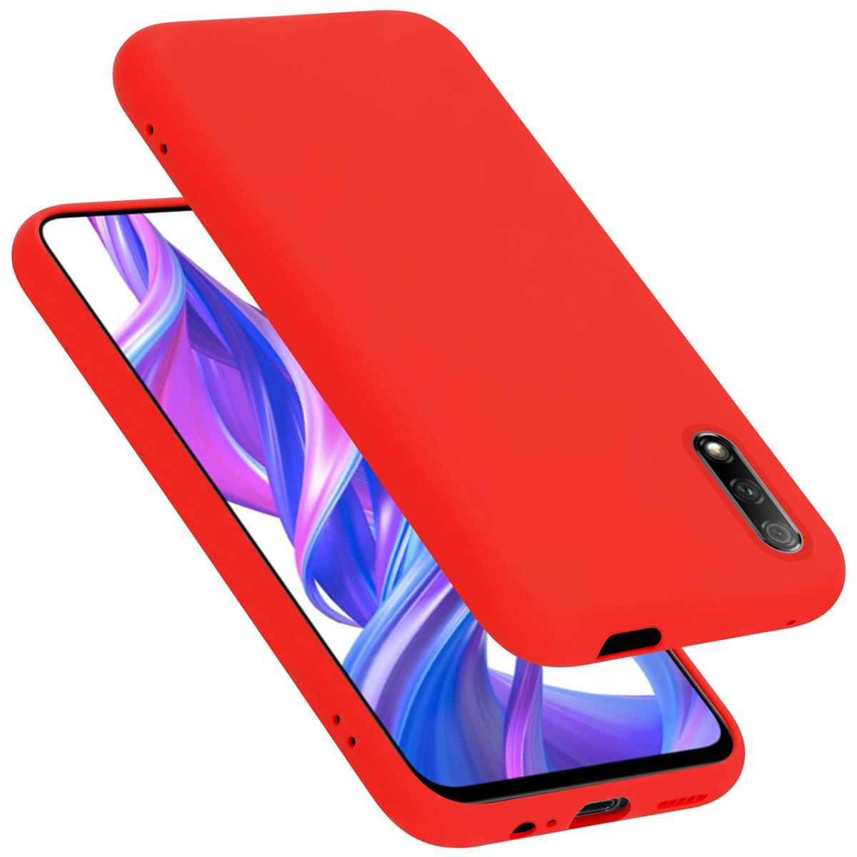 Funda y cubierta de teléfono roja. La cubierta está al lado de la funda. Fondo blanco.