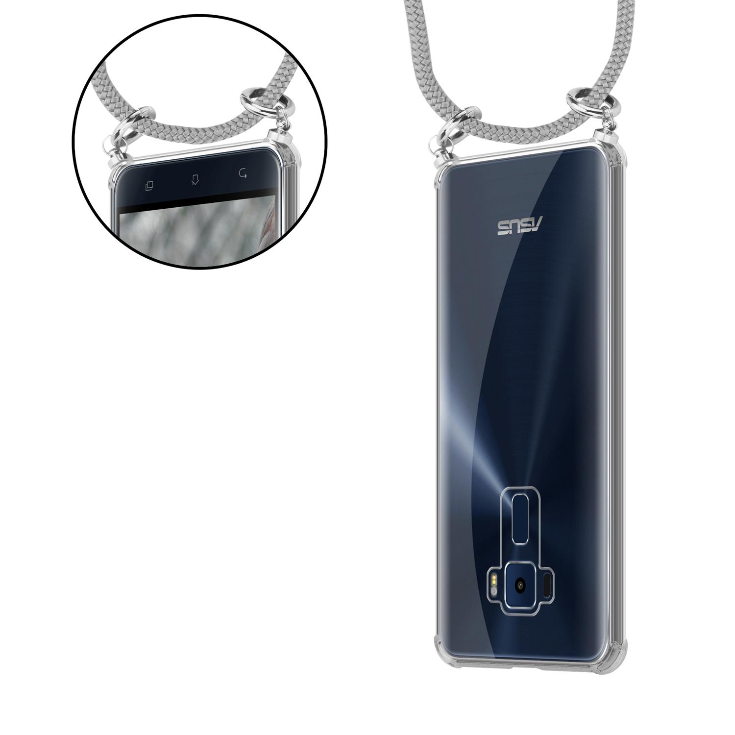 Transparente Handyhülle mit grauem Kabel. Das Telefon hat ein Asus-Logo. Detail zeigt Kabel und Telefon.