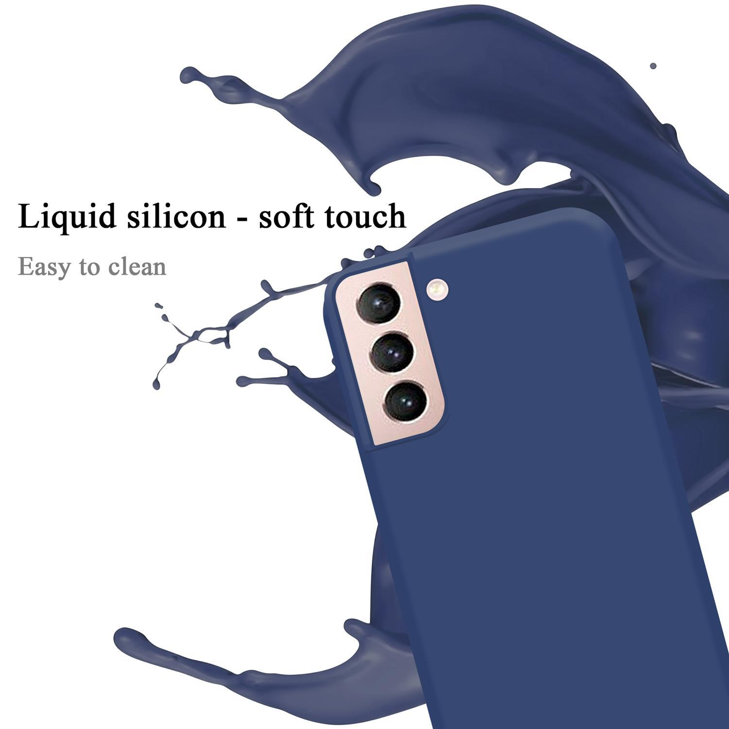 Custodia blu scuro con schizzo di liquido. Tre lenti della fotocamera. Testo: Silicio liquido - tocco morbido.