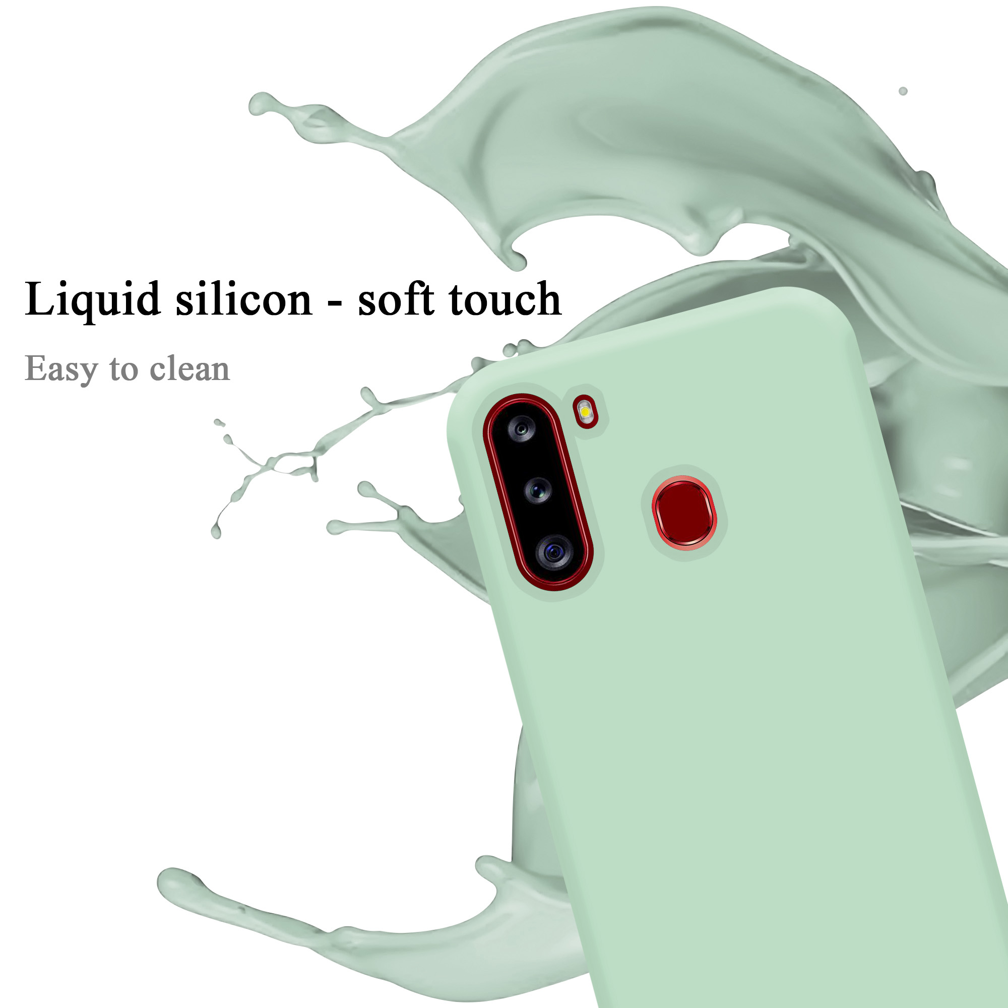 Custodia per telefono verde chiaro con anello rosso per fotocamera, schizzo di liquido. Testo: 'Liquid silicon'.