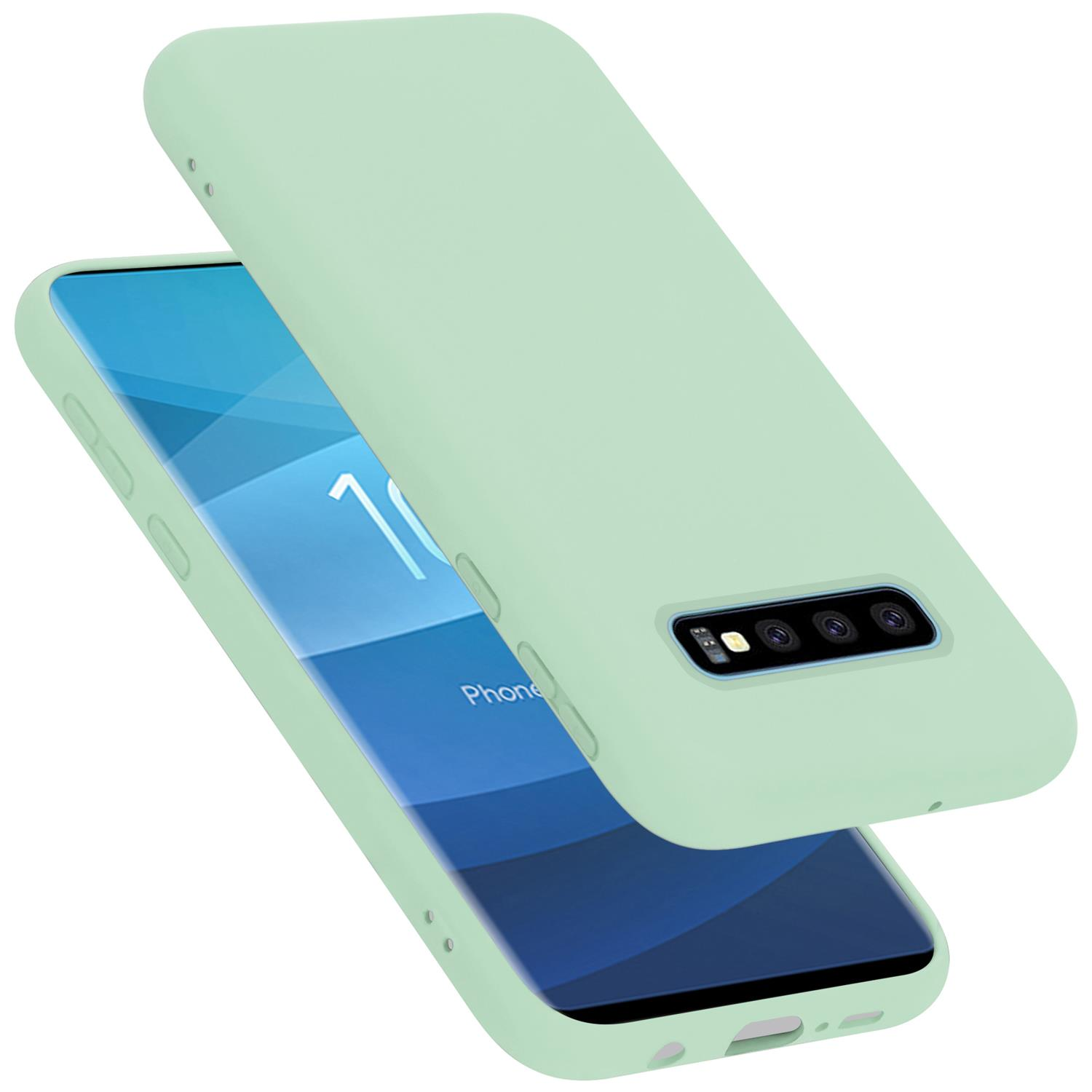 Hellgrüne Handyhülle über einem Handy. Das Handy zeigt einen Bildschirm und eine Kamera.