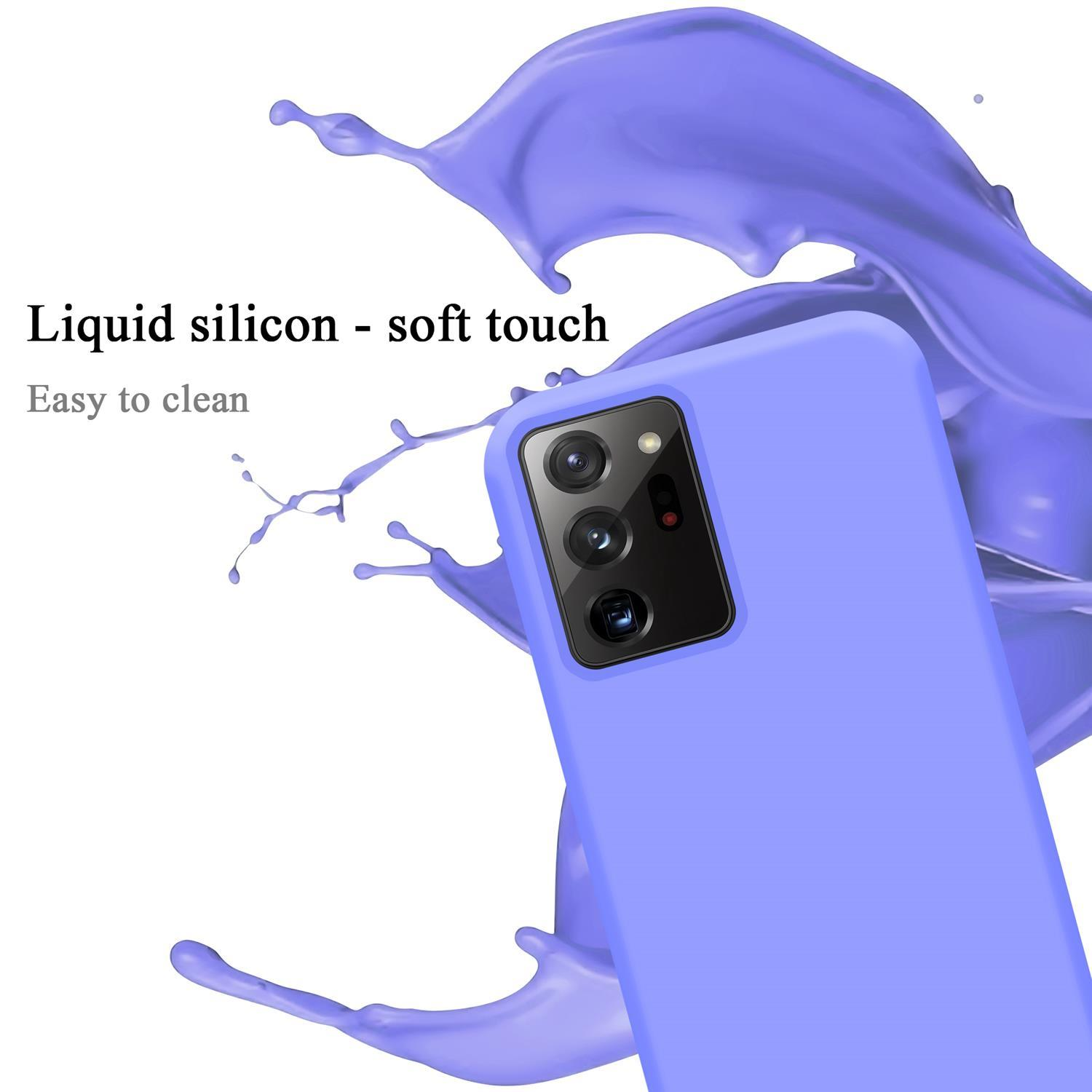 Blaue Handyhülle mit lila Flüssigkeitsspritzer und Text: „Flüssiges Silikon – Soft Touch“.