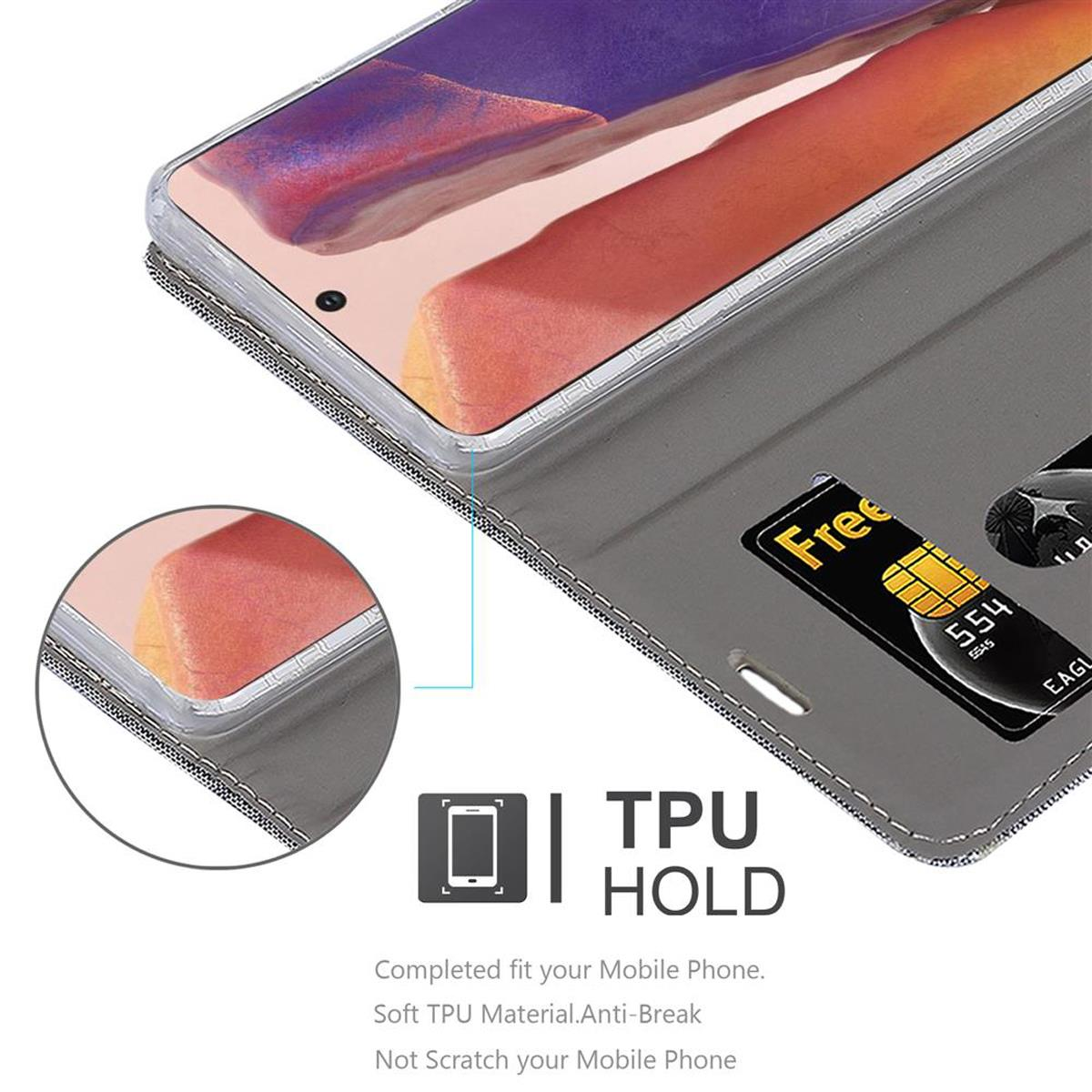 Un telefono in una custodia grigia a portafoglio con una carta visibile. Testo sovrapposto.