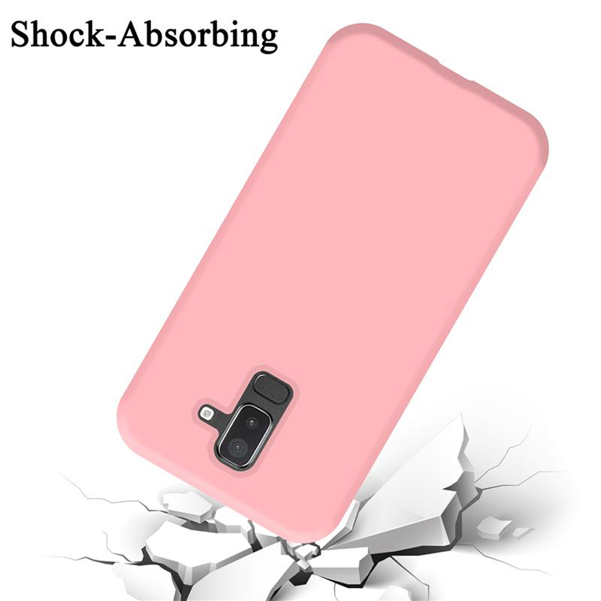 Una custodia per telefono rosa, con fotocamera e flash, che si rompe su una superficie bianca crepata.