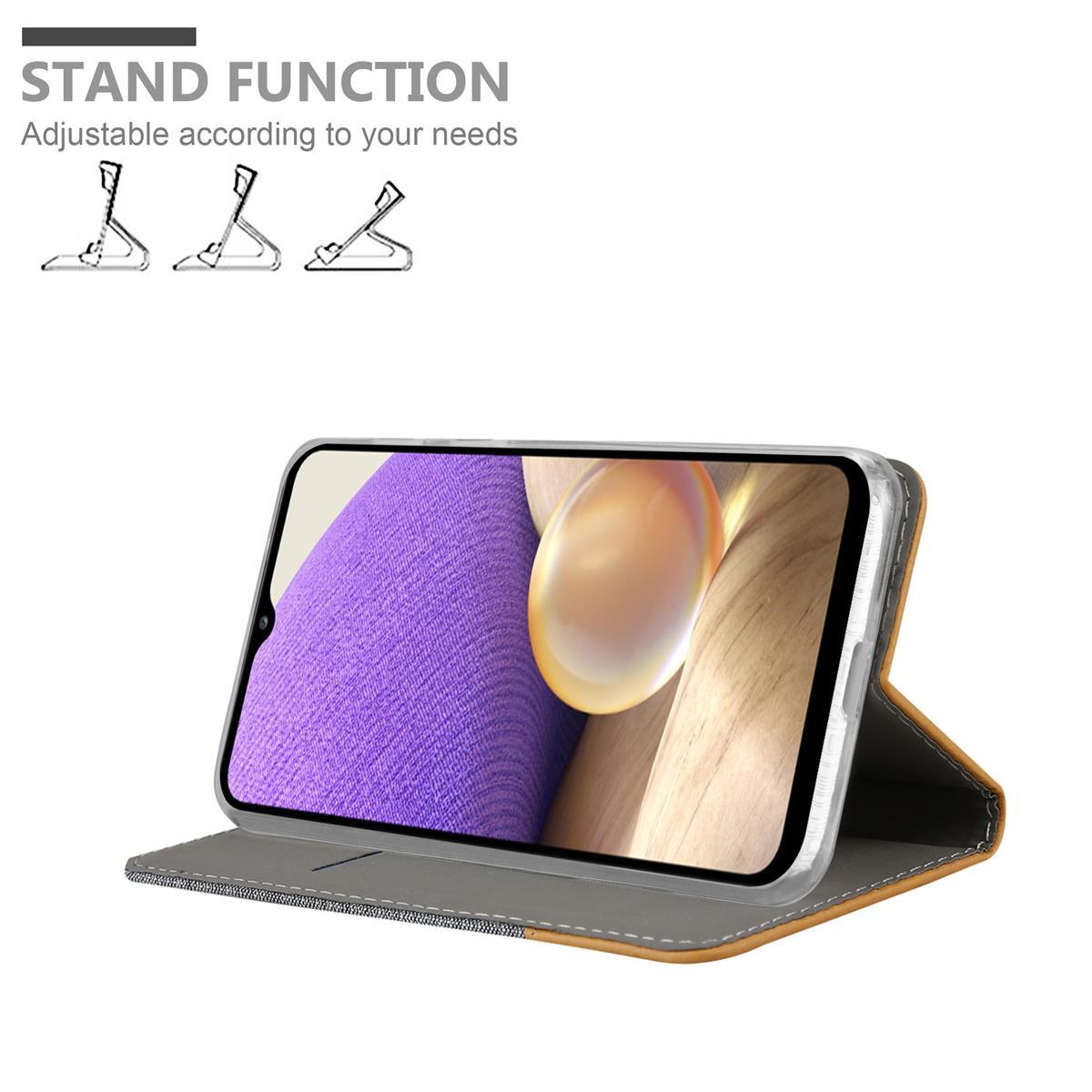 Telefono con custodia, funzione stand. Testo: Funzione stand. Lo schermo del telefono mostra il contenuto.