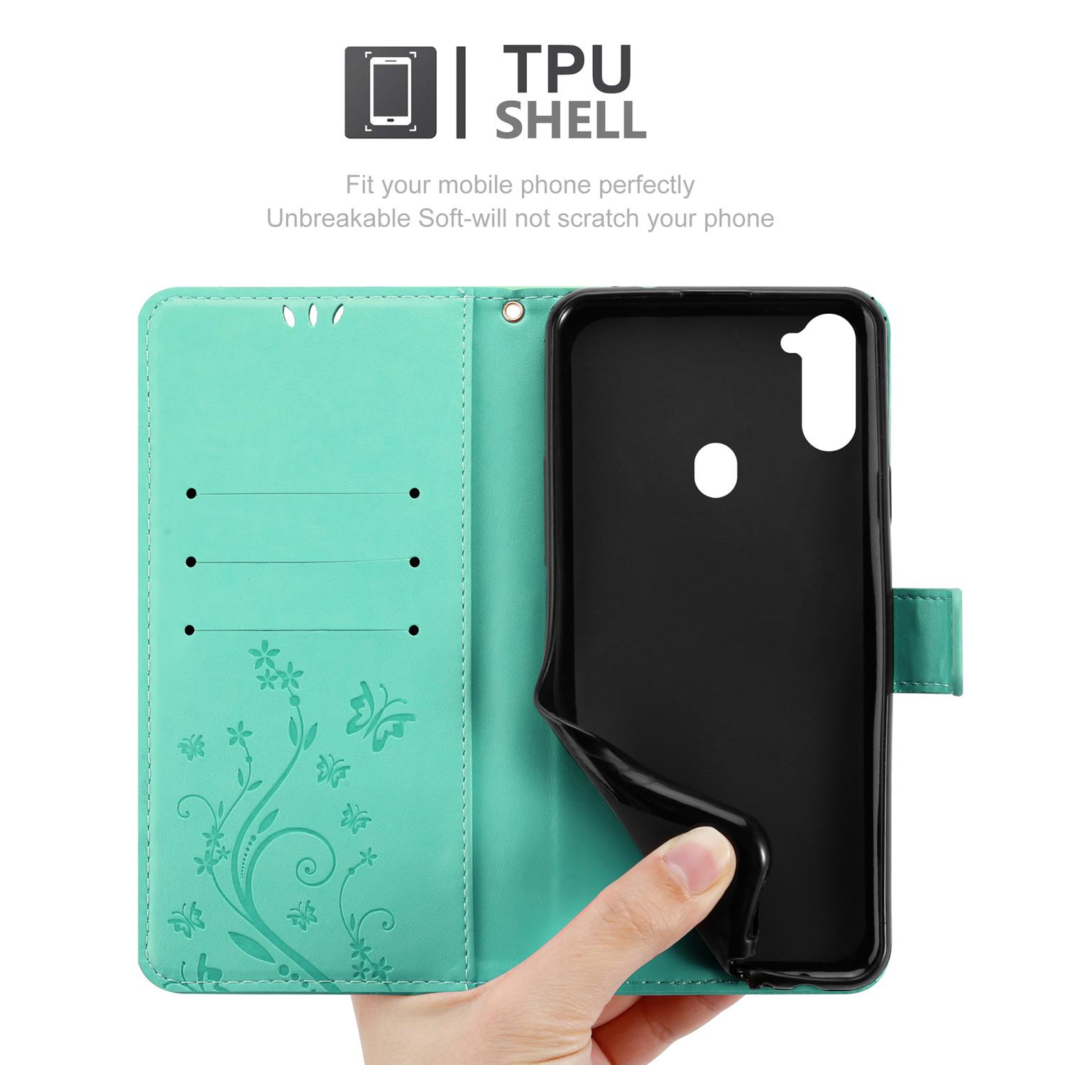 Custodia verde, aperta, con telefono nero e testo: Adatta perfettamente il tuo telefono. Morbida, non graffia.