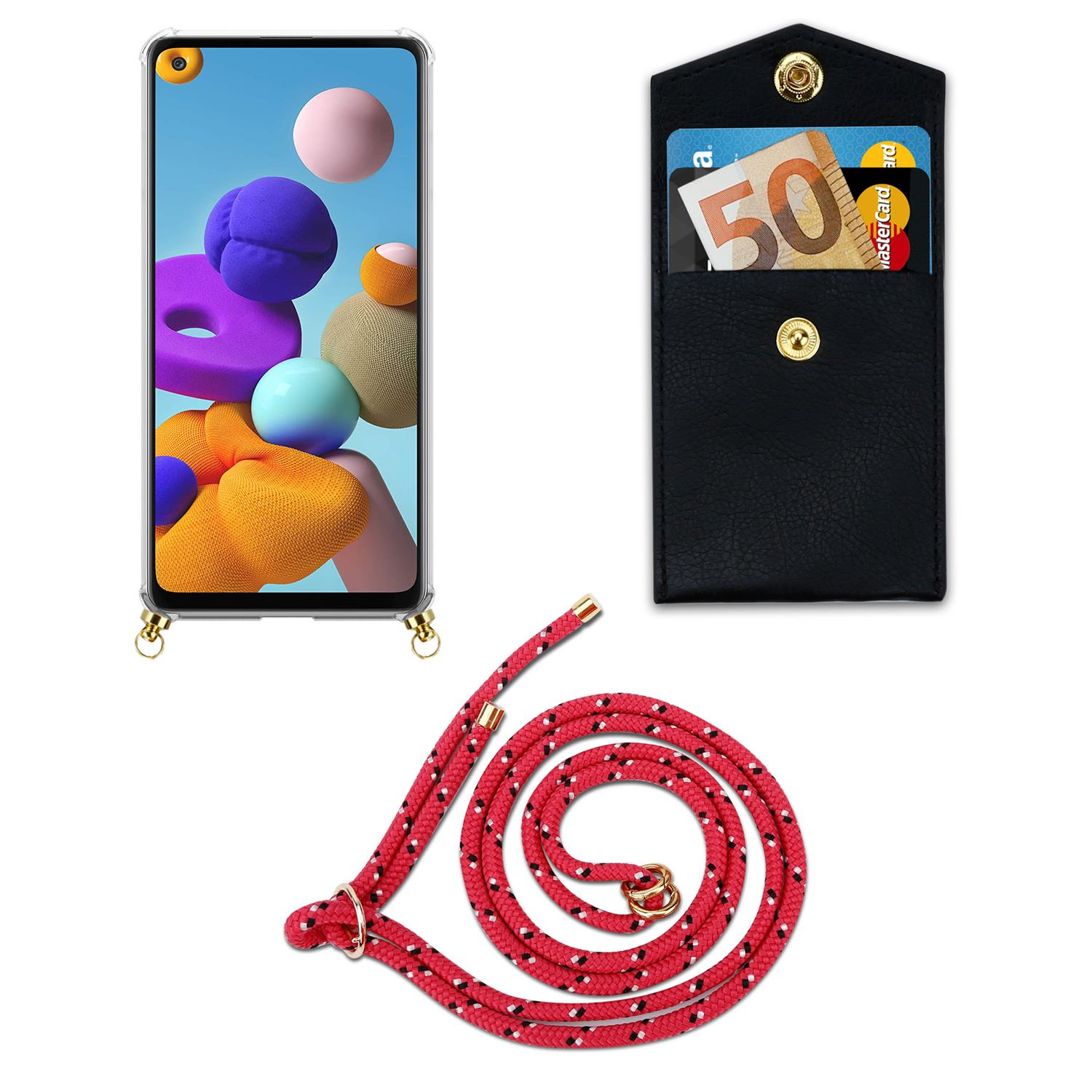 Un telefono con un cordino e un porta carte con carte. Il cordino è rosso e bianco.