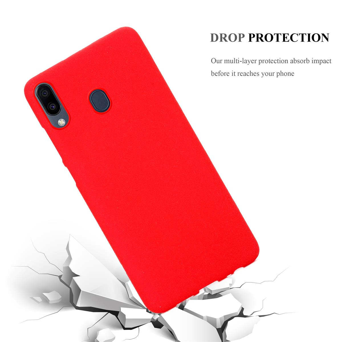 Custodia per telefono rossa che cade, con testo di protezione dagli impatti e crepe su superficie bianca.