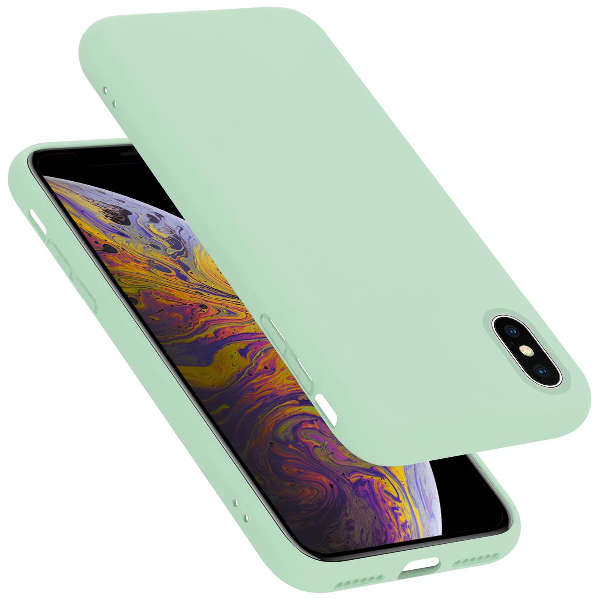 Eine hellgrüne Handyhülle mit dem Telefon darin.