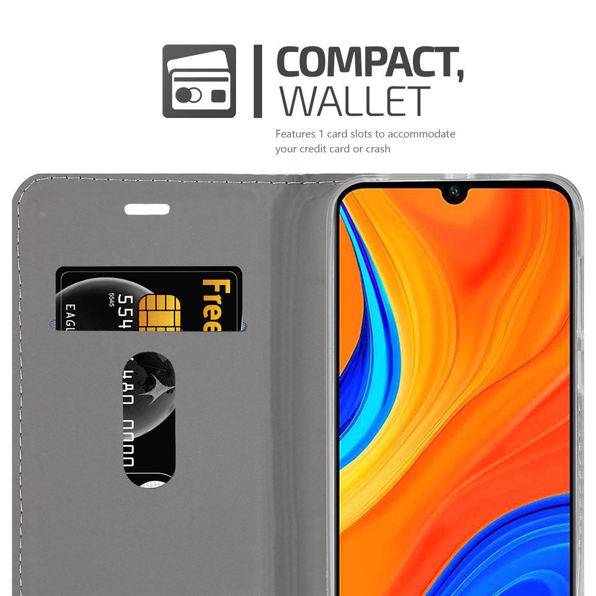 Custodia per telefono con design a portafoglio. La custodia ha uno slot per carte con una carta di credito. Il telefono è arancione.