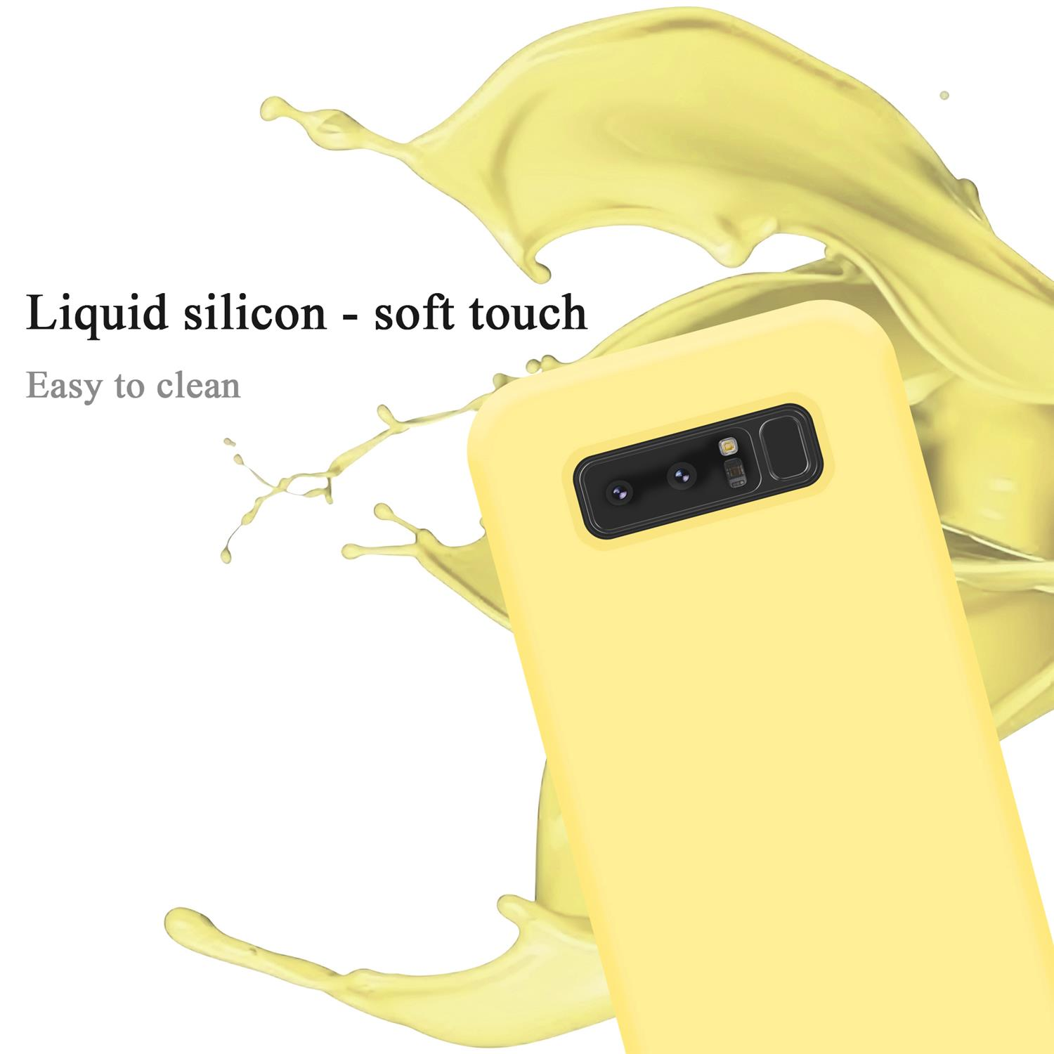 Una custodia gialla per telefono con un telefono all'interno. Il testo mostra 'Silicone liquido - tocco morbido' e 'Facile da pulire'.