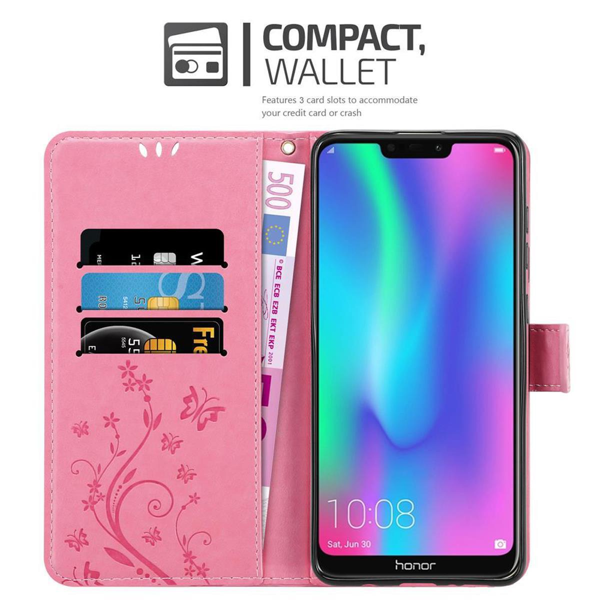 Un portafoglio rosa per custodia del telefono con un telefono all'interno. Dispone di slot per carte e tasca per denaro con banconota.