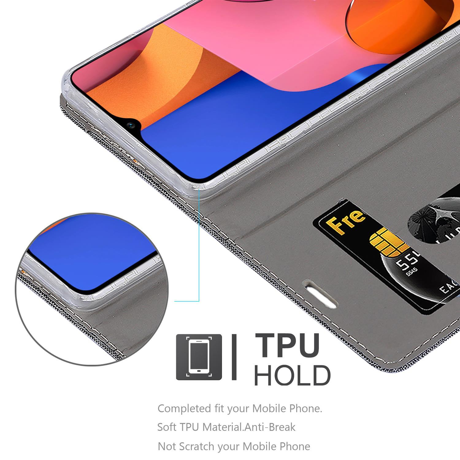 Eine Handyhülle mit einem Telefon darin. Text: TPU HOLD. Enthält Kreditkarten.