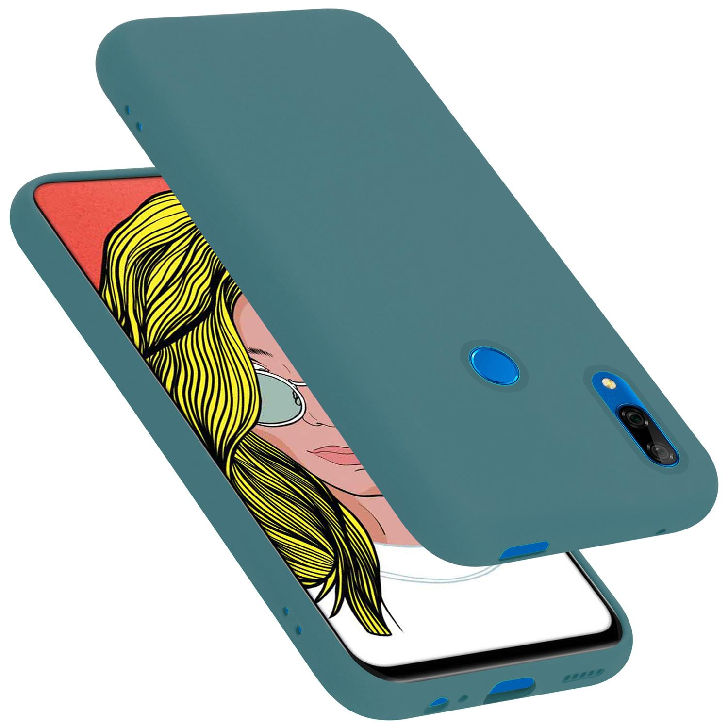 Türkisfarbene Handyhülle mit Blondinenillustration. Die obere Hülle ist abgenommen, das Telefon wird sichtbar.
