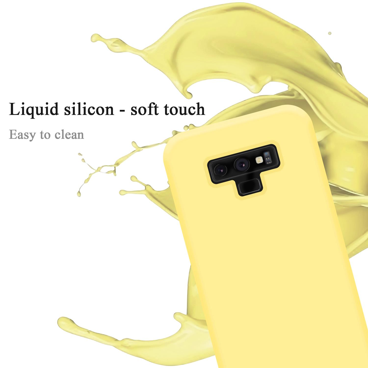 Eine gelbe Handyhülle mit einem Flüssigkeitsspritzer-Design. Die Handyhülle ist ein Soft-Touch.