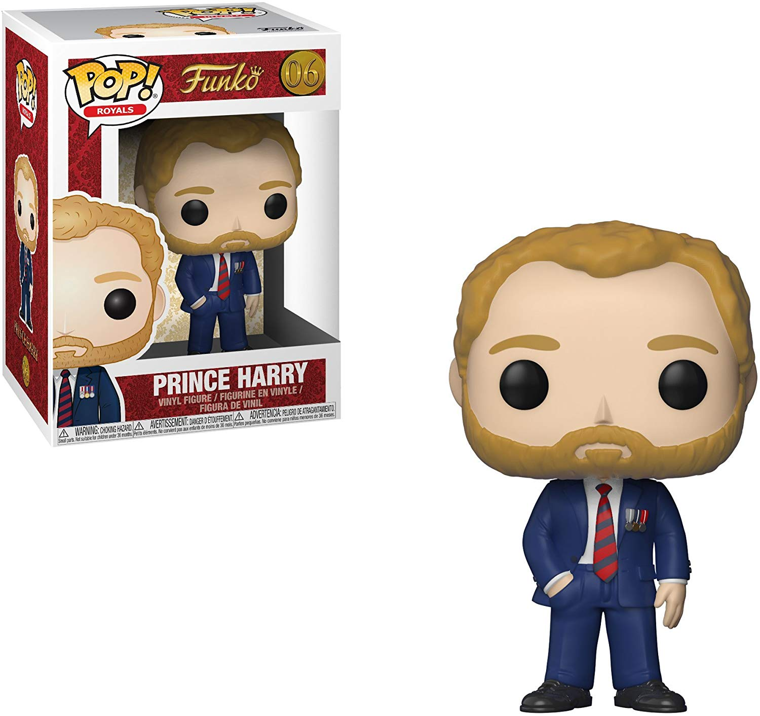 Una statuetta Funko Pop del principe Harry in una scatola. La statuetta indossa un abito e una cravatta e ha la barba.