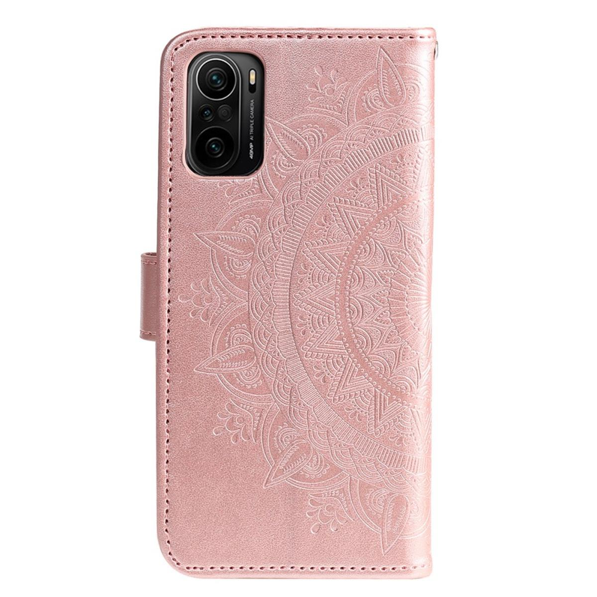 Rosa Handyhülle mit Mandala-Design, Kamera und Magnetverschluss.