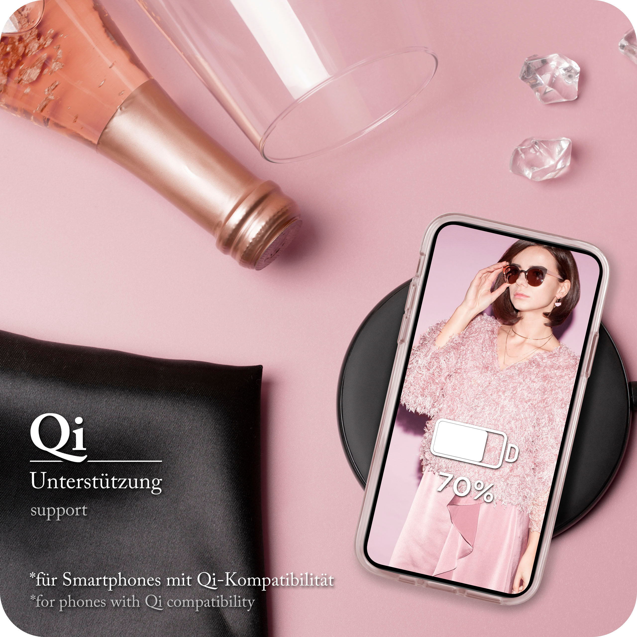 Telefon in klarer Hülle auf kabellosem Ladegerät. Flasche und Glas im Hintergrund. Das Telefon zeigt 70% Ladung.