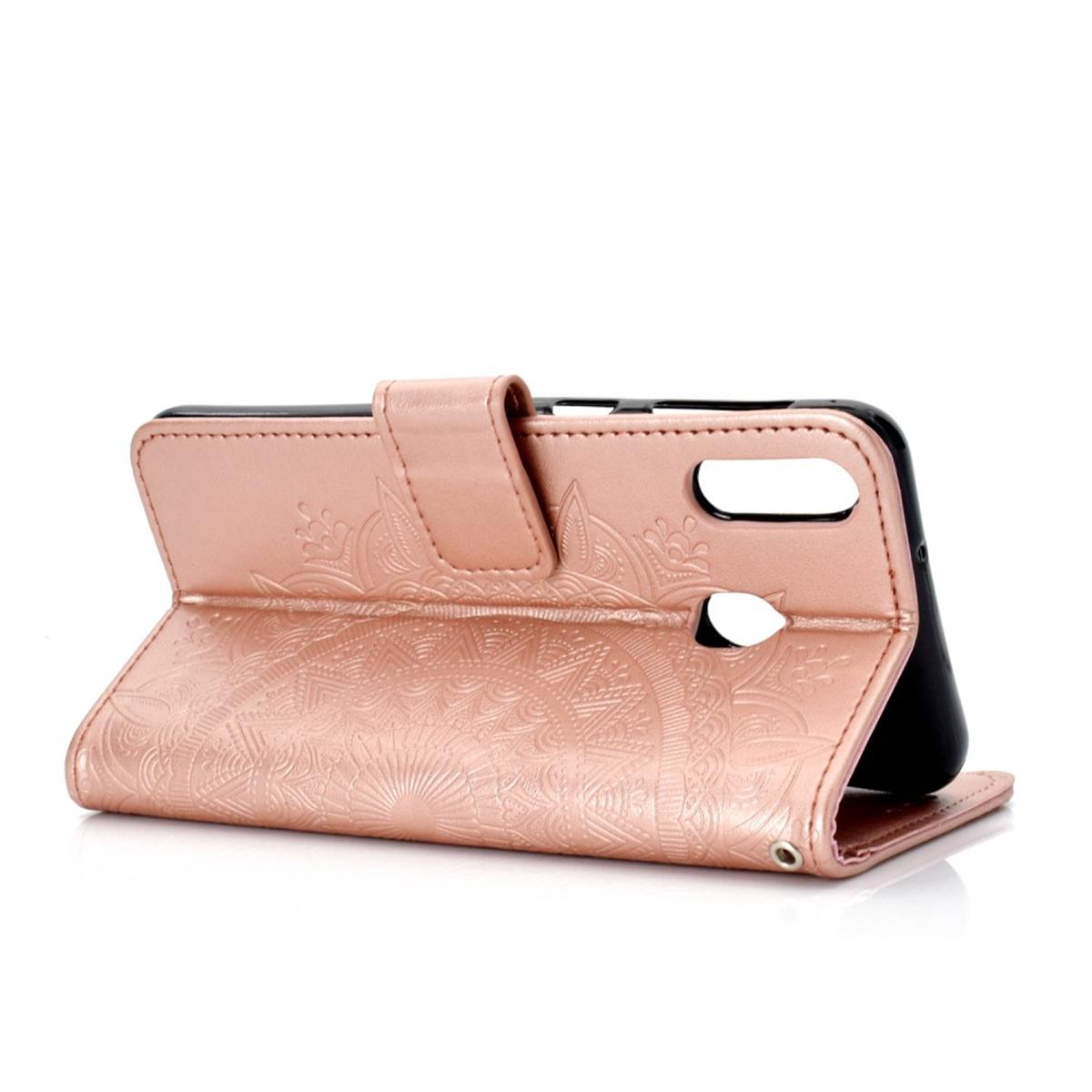 Eine roségoldene Handyhülle ist geöffnet und zeigt das Telefon. Die Hülle hat ein florales Design.