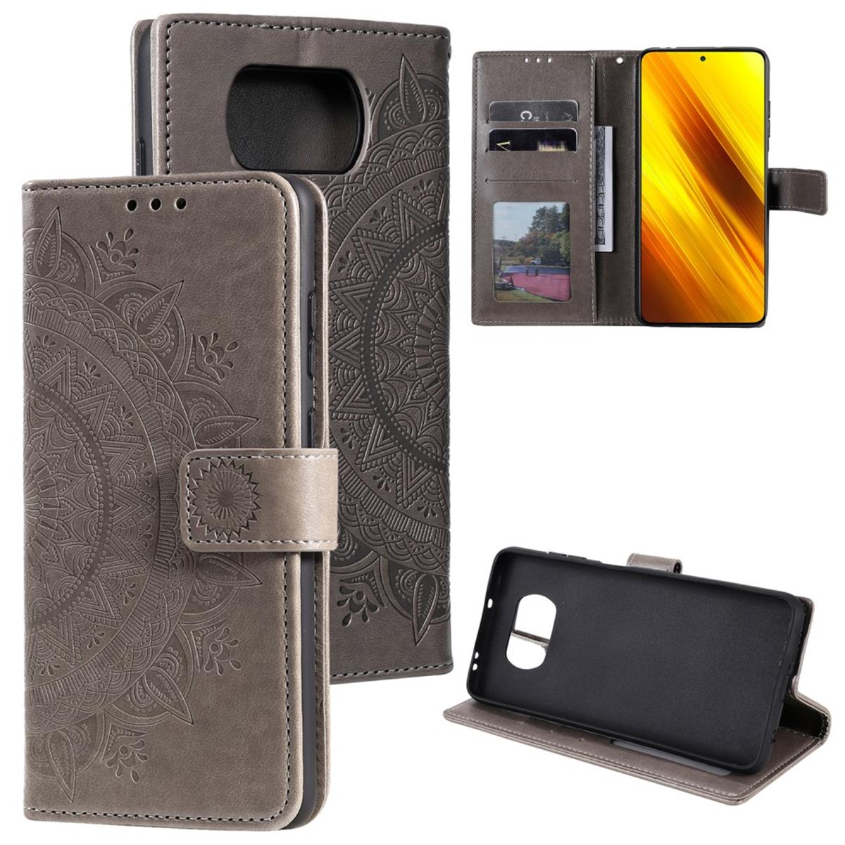 Graue Handyhülle mit Mandala-Design, Vorder- und Rückansicht, mit Telefon und Karten.