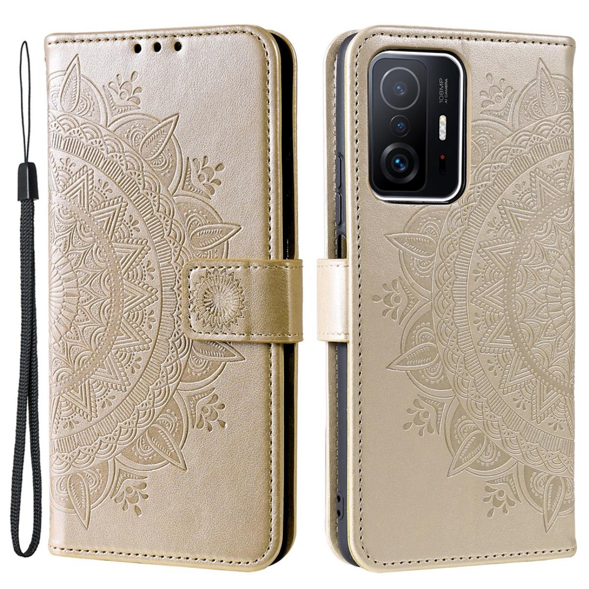 Goldene Handyhülle, offen, mit Mandala-Design. Merkmale sind ein Kartenfach und eine Handschlaufe.