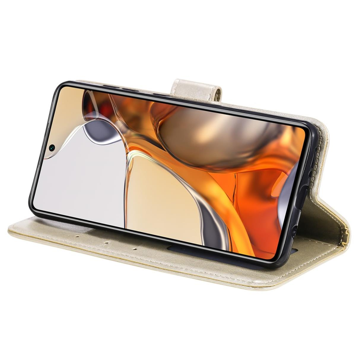 Geöffnete goldene Handyhülle mit Telefon, das abstrakte warme Farben anzeigt.