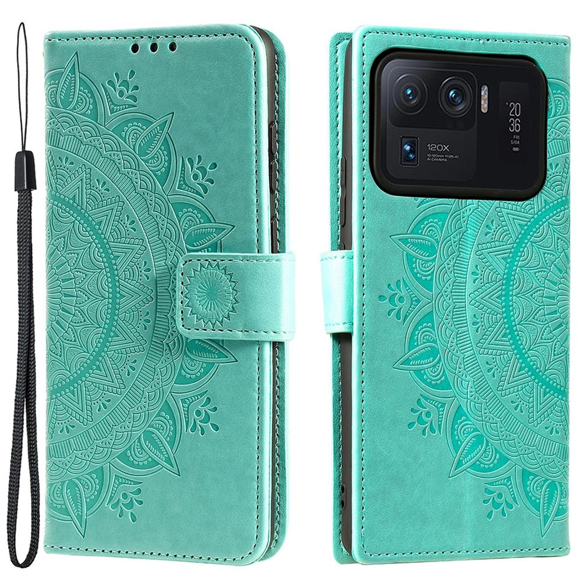 Türkis Handyhülle mit Mandala-Design. Geöffnet und geschlossen, mit Telefon darin.
