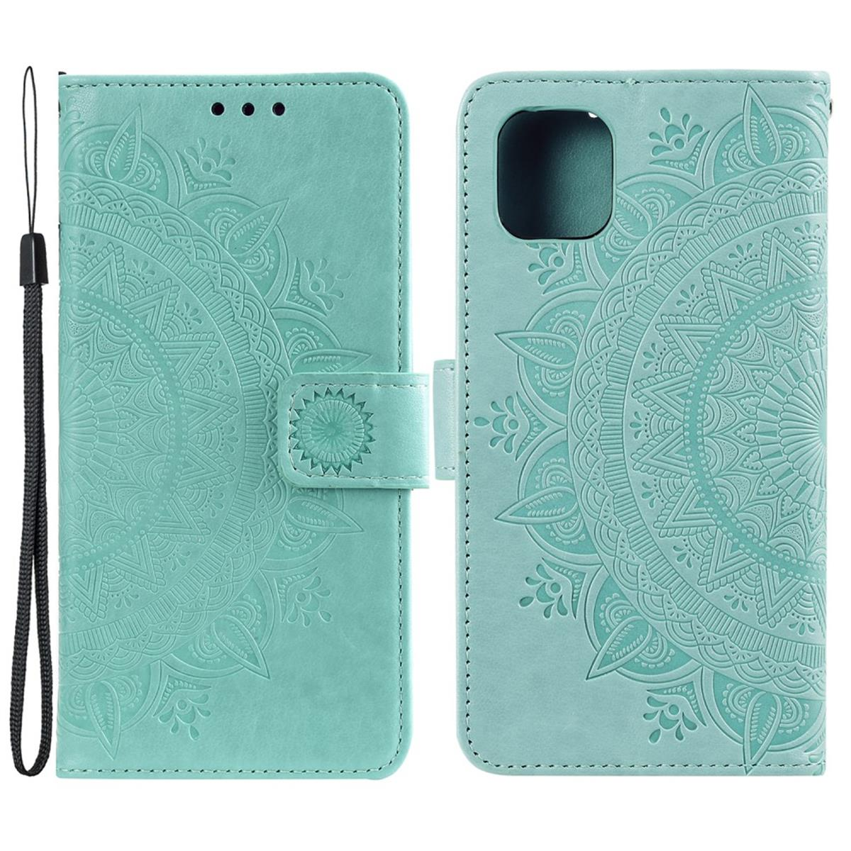 Minzfarbene Handyhülle mit Mandala-Design. Geöffnet, Telefon und Riemen sichtbar. Vorder- und Rückseite.