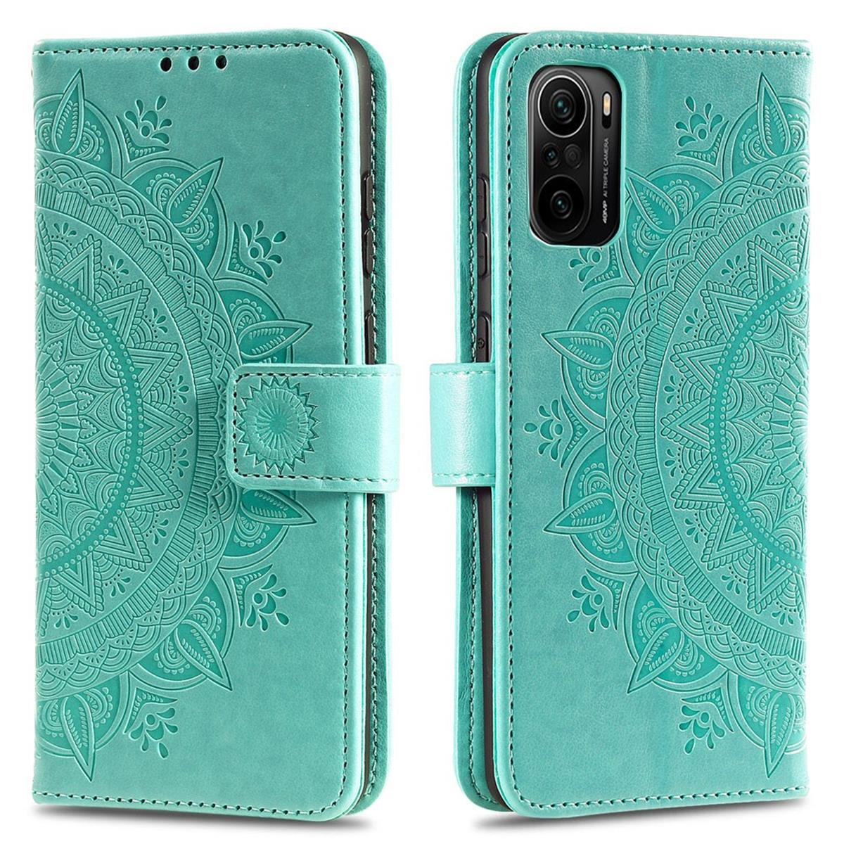 Türkisfarbene Handyhülle, offen, mit Mandala-Design. Die Handyhülle wird in mehreren Ansichten angezeigt.
