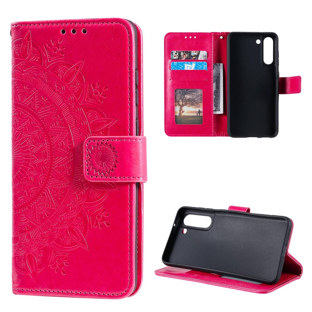 Eine rote Handyhülle ist geöffnet und zeigt Kartenfächer und ein Telefon.