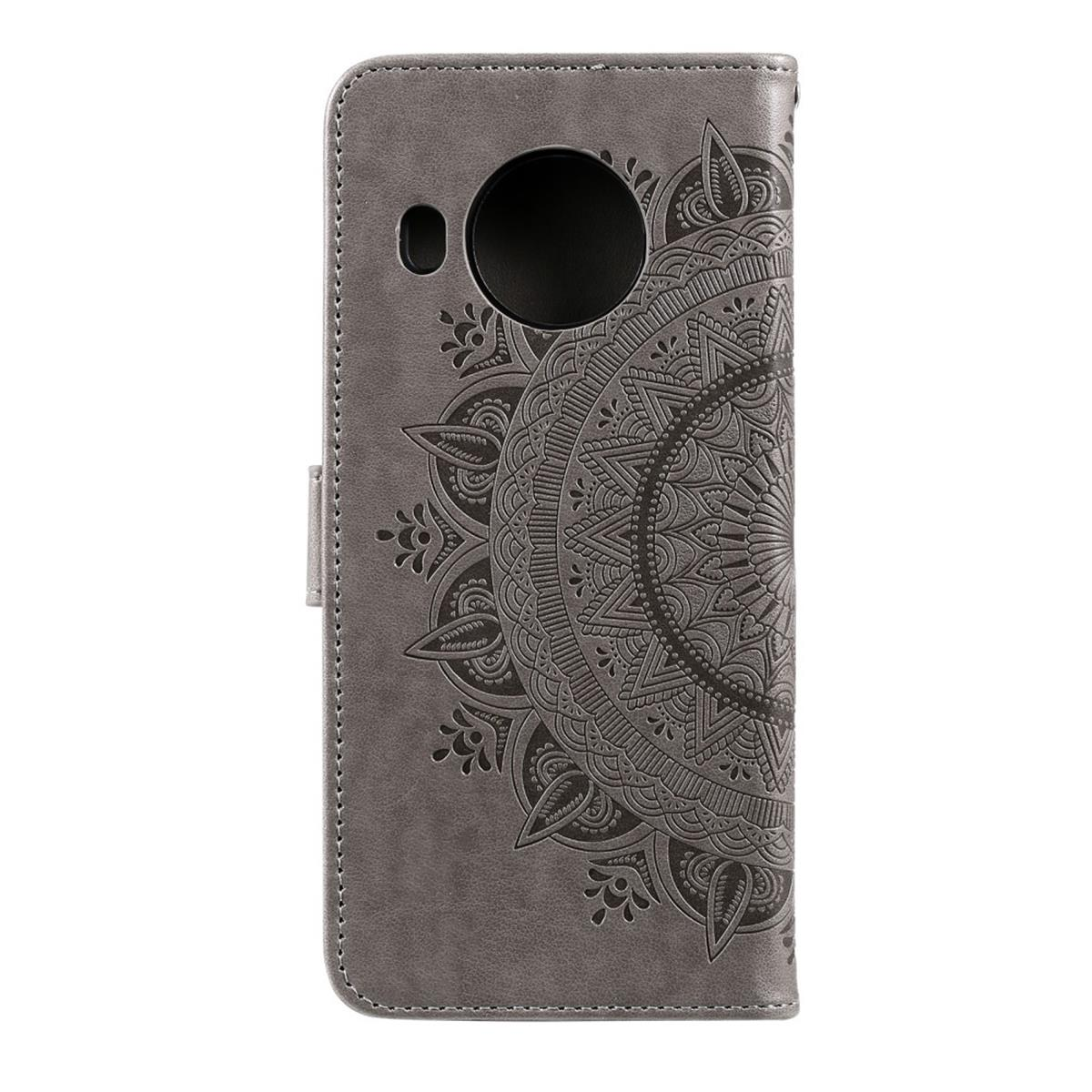 Graue Handyhülle mit Mandala-Design, Nahaufnahme der geschlossenen Hülle.