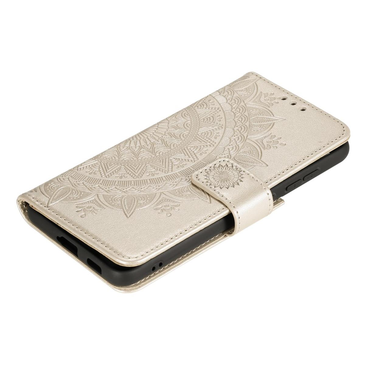 Goldenes Handycase mit Mandala-Design, offenbart ein Handy, Karten und Bargeld im Inneren.