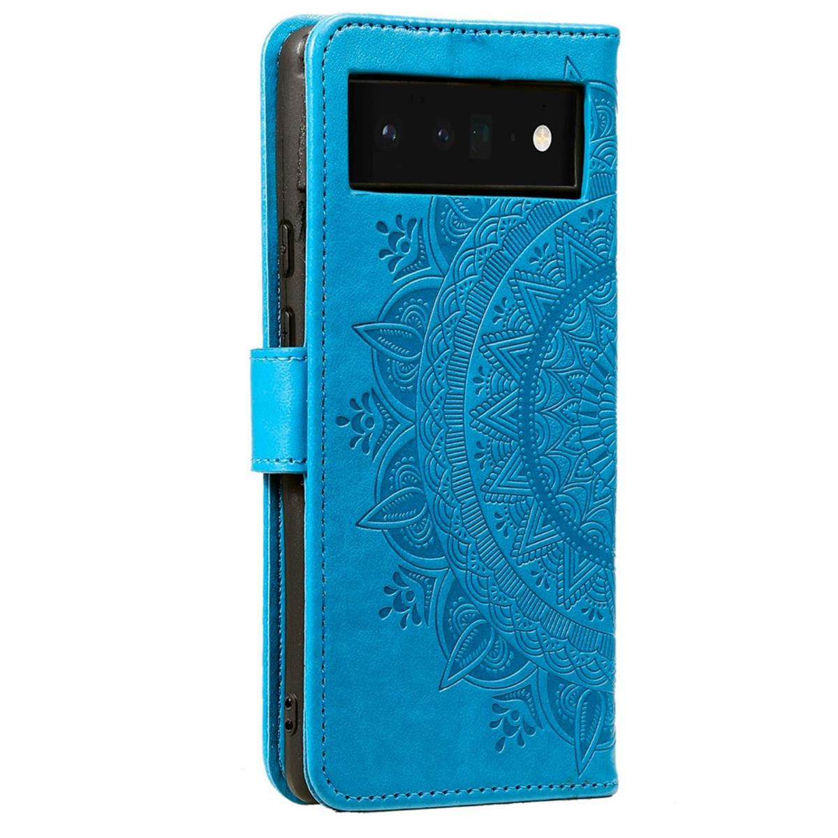 Blaue Handyhülle mit Mandala-Design und einem Telefon im Inneren. Die Hülle ist geöffnet.