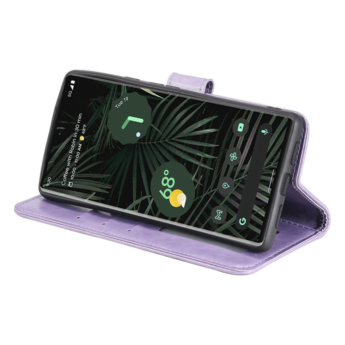 Offene Handyhülle mit einem Telefon darin. Das Telefon zeigt einen Startbildschirm mit Symbolen.