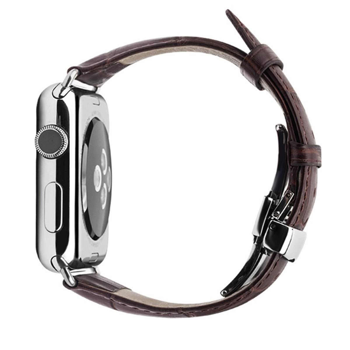 Eine silberne Apple Watch mit braunem Lederarmband. Die Uhr ist von der Seite zu sehen.