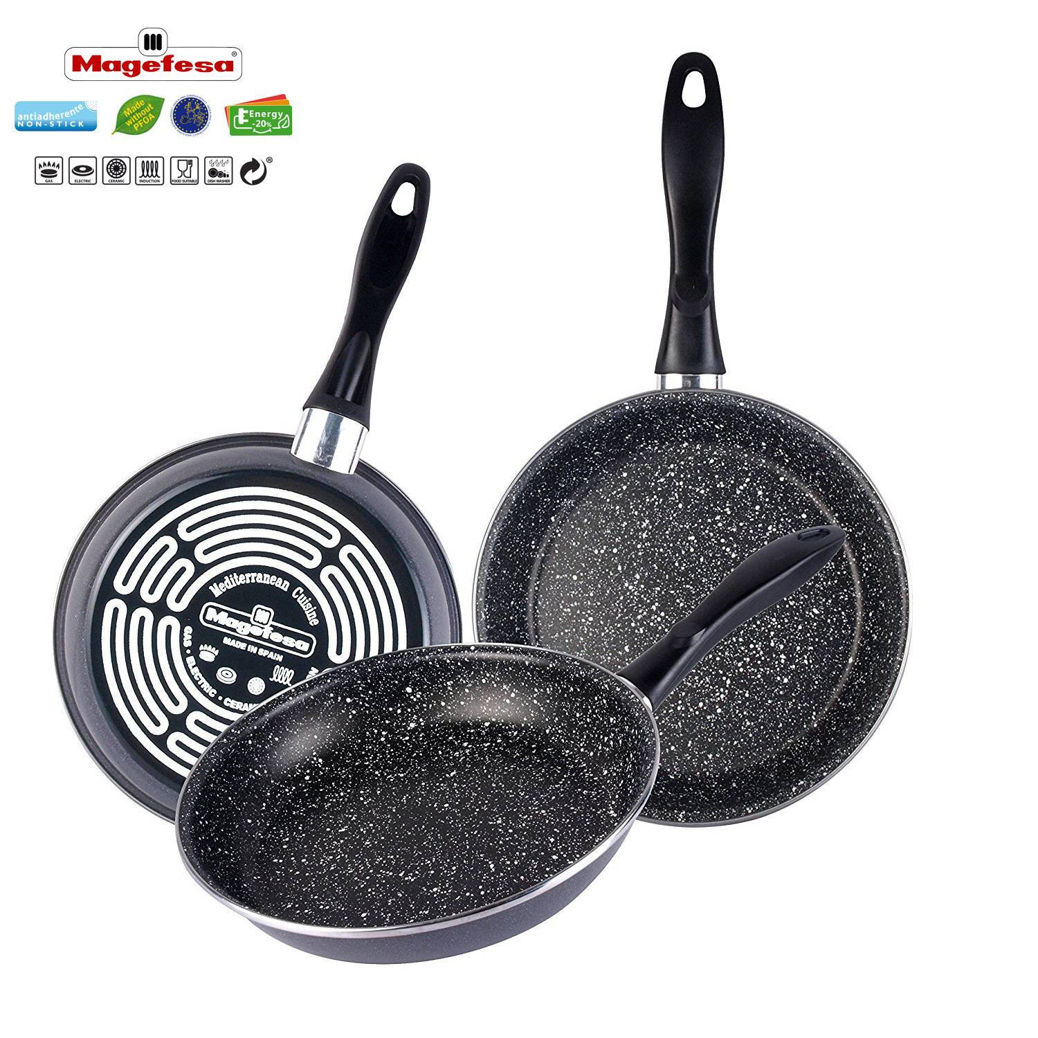 Juego de tres sartenes negras con un diseño moteado y mangos negros.
