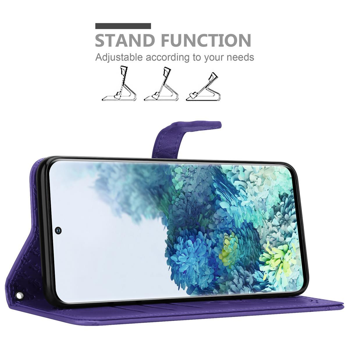 Custodia per telefono viola con un telefono all'interno, in piedi. Ha una funzione di supporto.