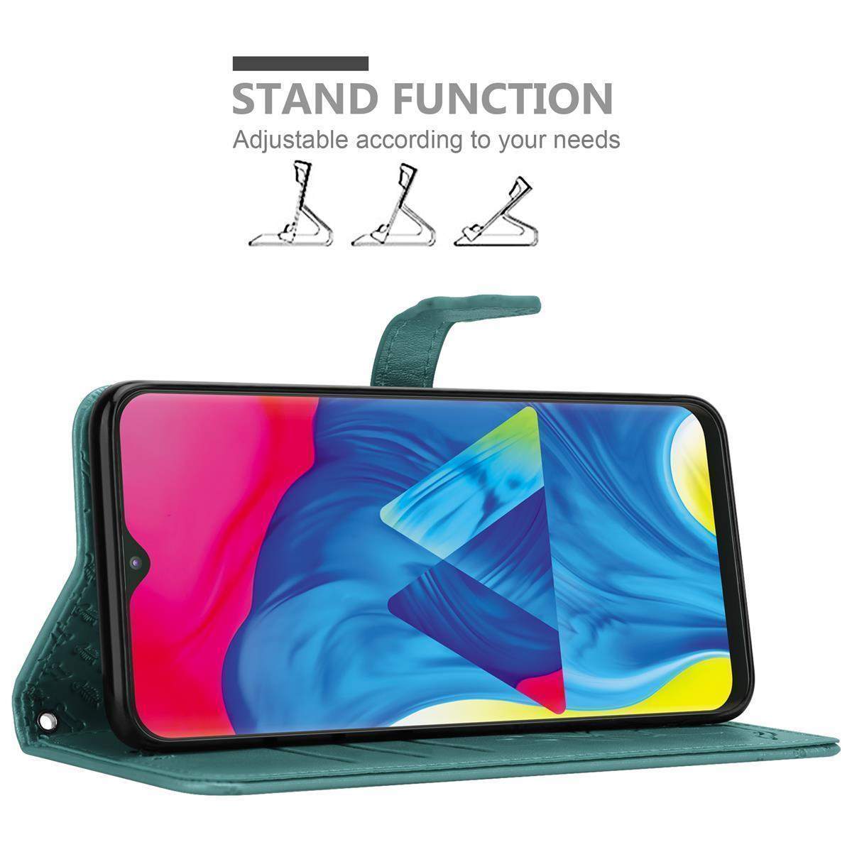 Grüne Handyhülle, die als Ständer für das Telefon verwendet wird und einen blau-gelben Bildschirm anzeigt.