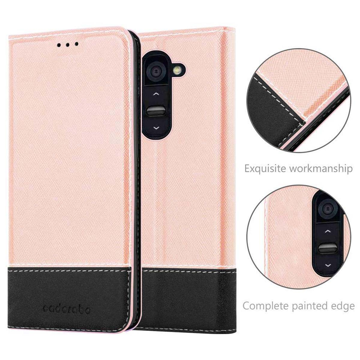 Coque de téléphone rose avec fond noir, ouverte pour montrer le téléphone. Détails des coutures et de la caméra.