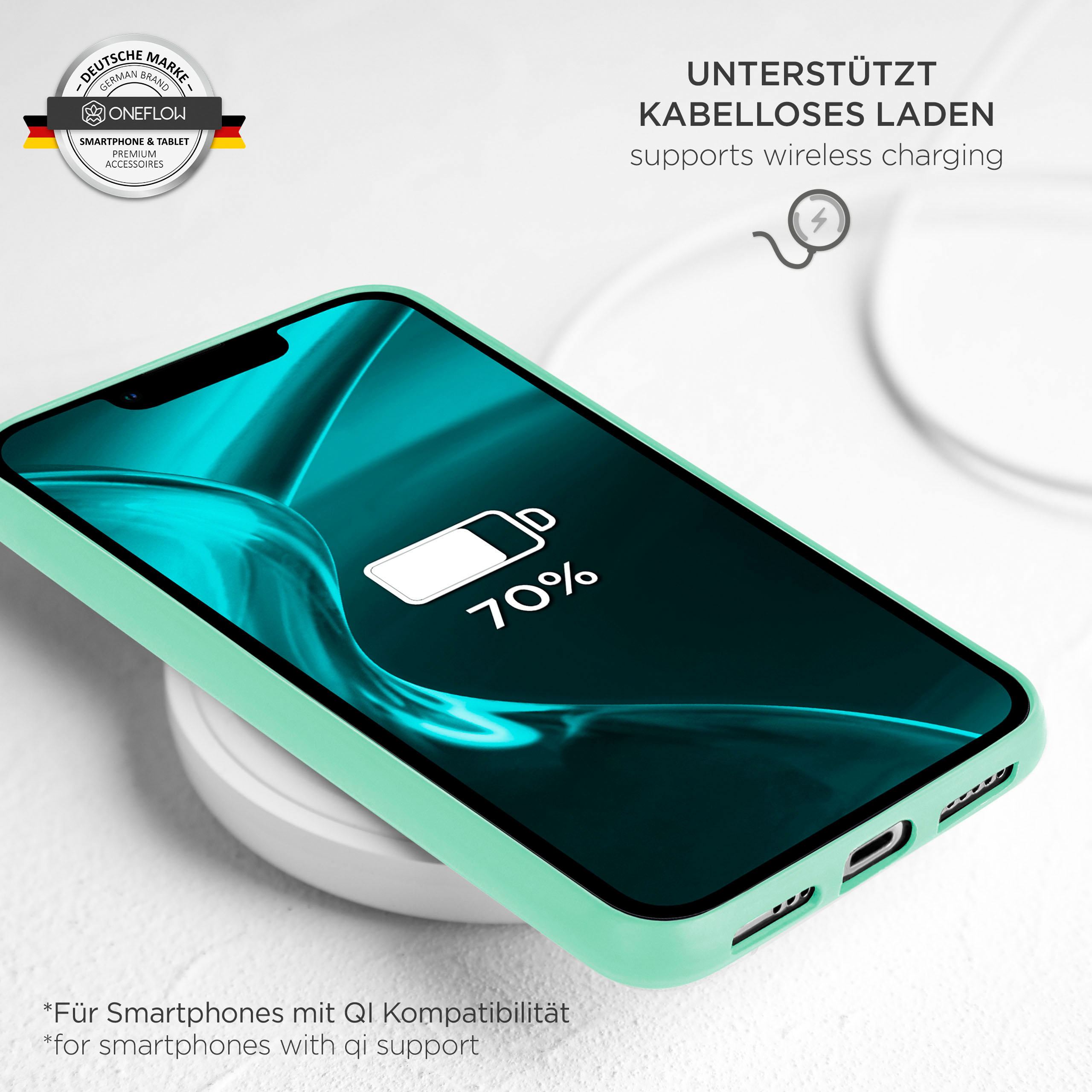 Ein türkisfarbenes Telefon mit Hülle auf einem kabellosen Ladepad. Der Bildschirm zeigt 70% Akkulaufzeit an.