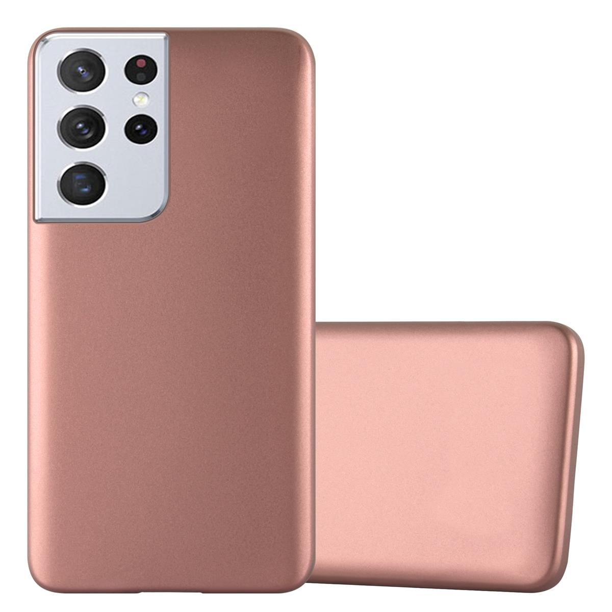 Telefono con custodia. La custodia è oro rosa. Ci sono più fotocamere. La custodia è sdraiata.