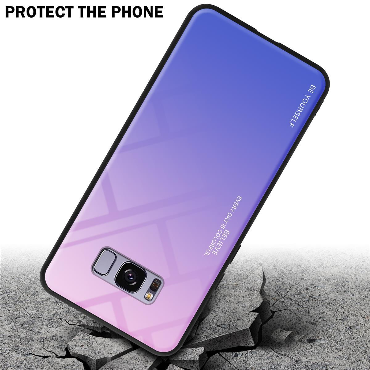 Telefono in una custodia. Colori sfumati dal rosa al viola. Il telefono è su una superficie incrinata.