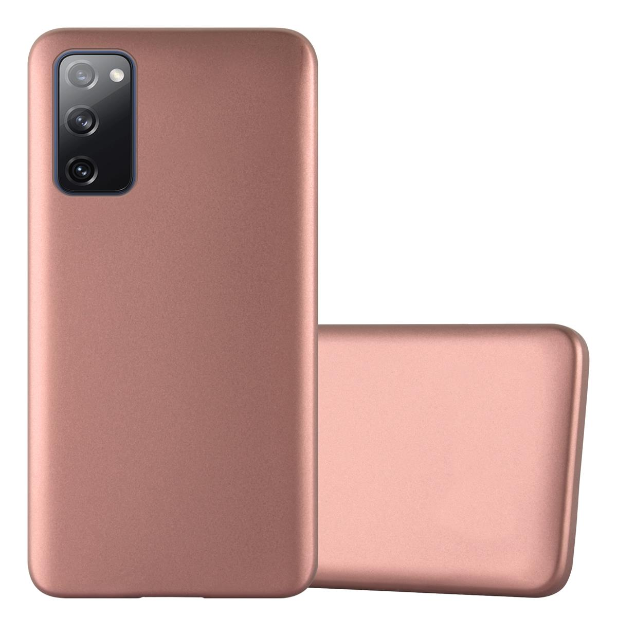 Roségoldfarbene Handyhülle neben einem Telefon. Die Hülle hat eine glatte Oberfläche und bedeckt die Rückseite.