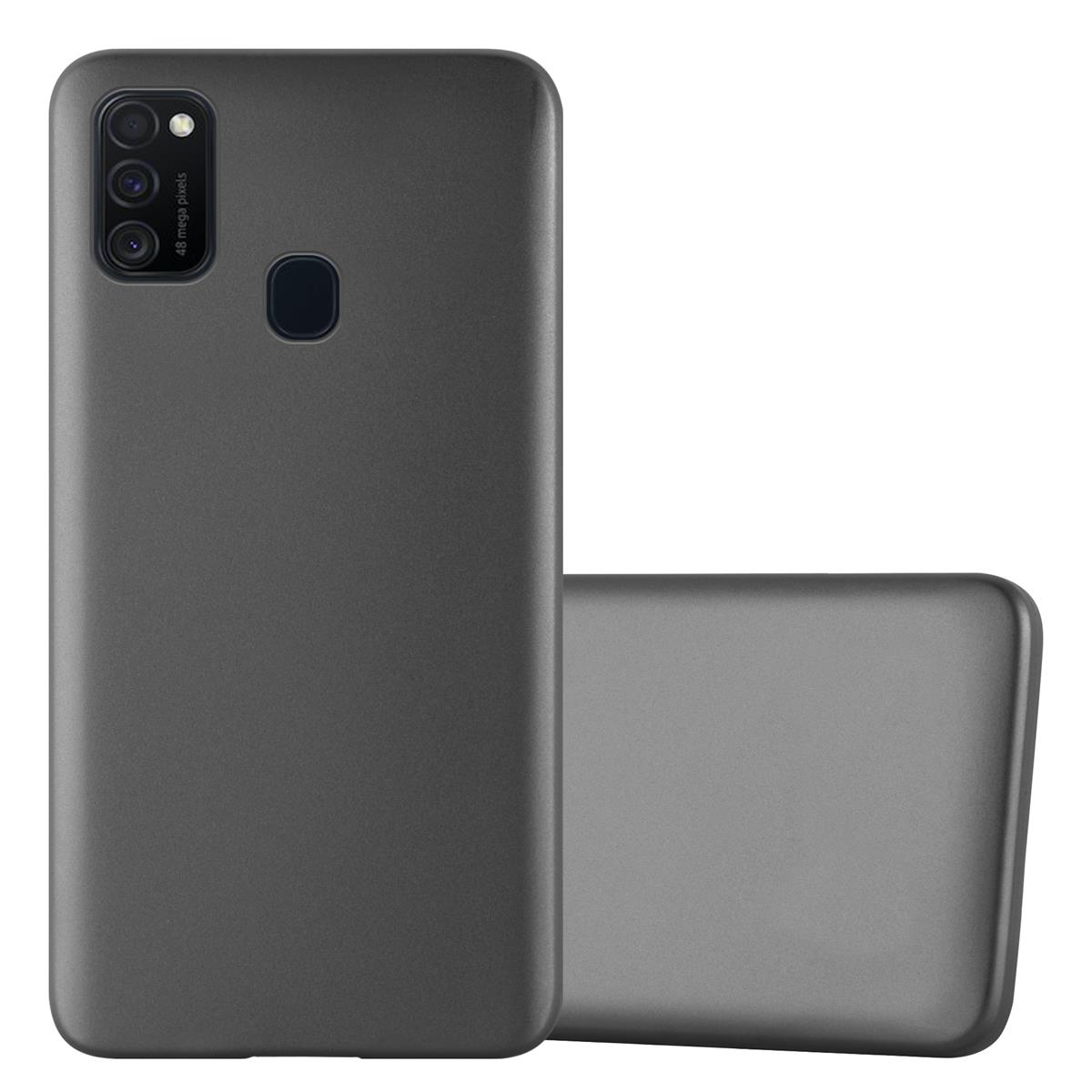 Funda gris para teléfono. Una funda está en un teléfono y la otra está al lado.