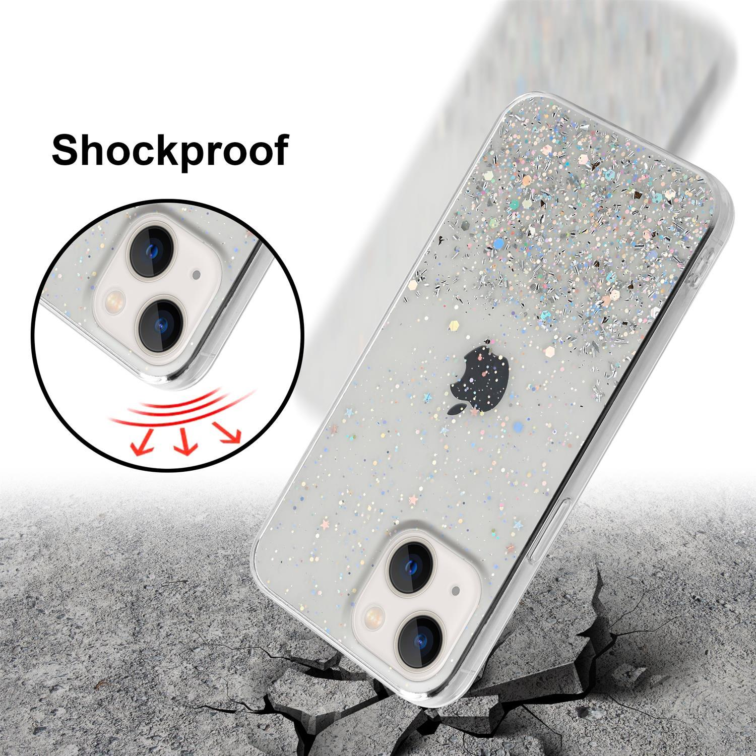 Transparente Glitzer-Handyhülle, darunter Riss. Text sagt 'Shockproof'. Das Telefon liegt am Boden.