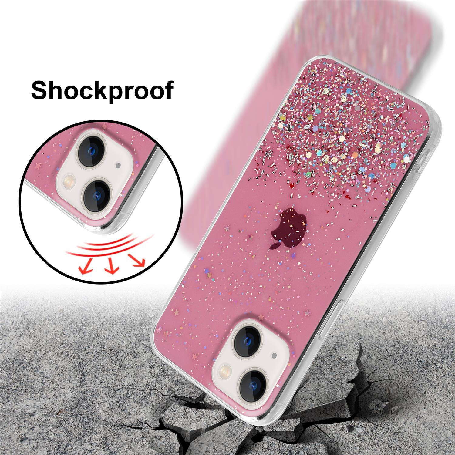 Rosa Handyhülle mit Glitzer und Sternen. Das Telefon liegt auf einer zerbrochenen Betonoberfläche. Stoßfest.