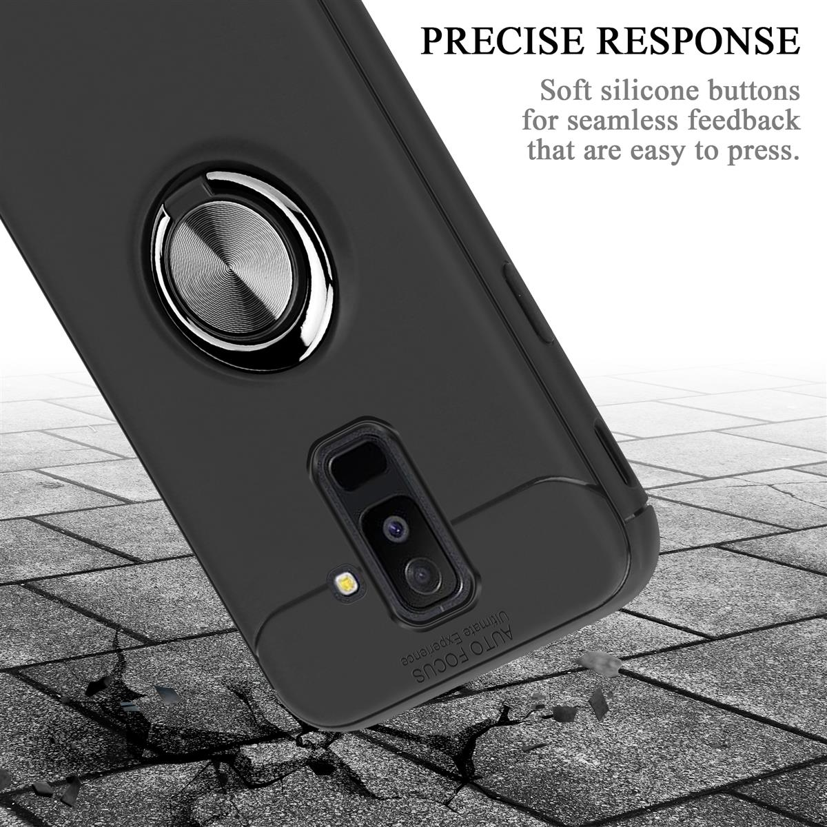 Primo piano di una custodia per telefono con un porta anello. La custodia è su una superficie di cemento crepata.