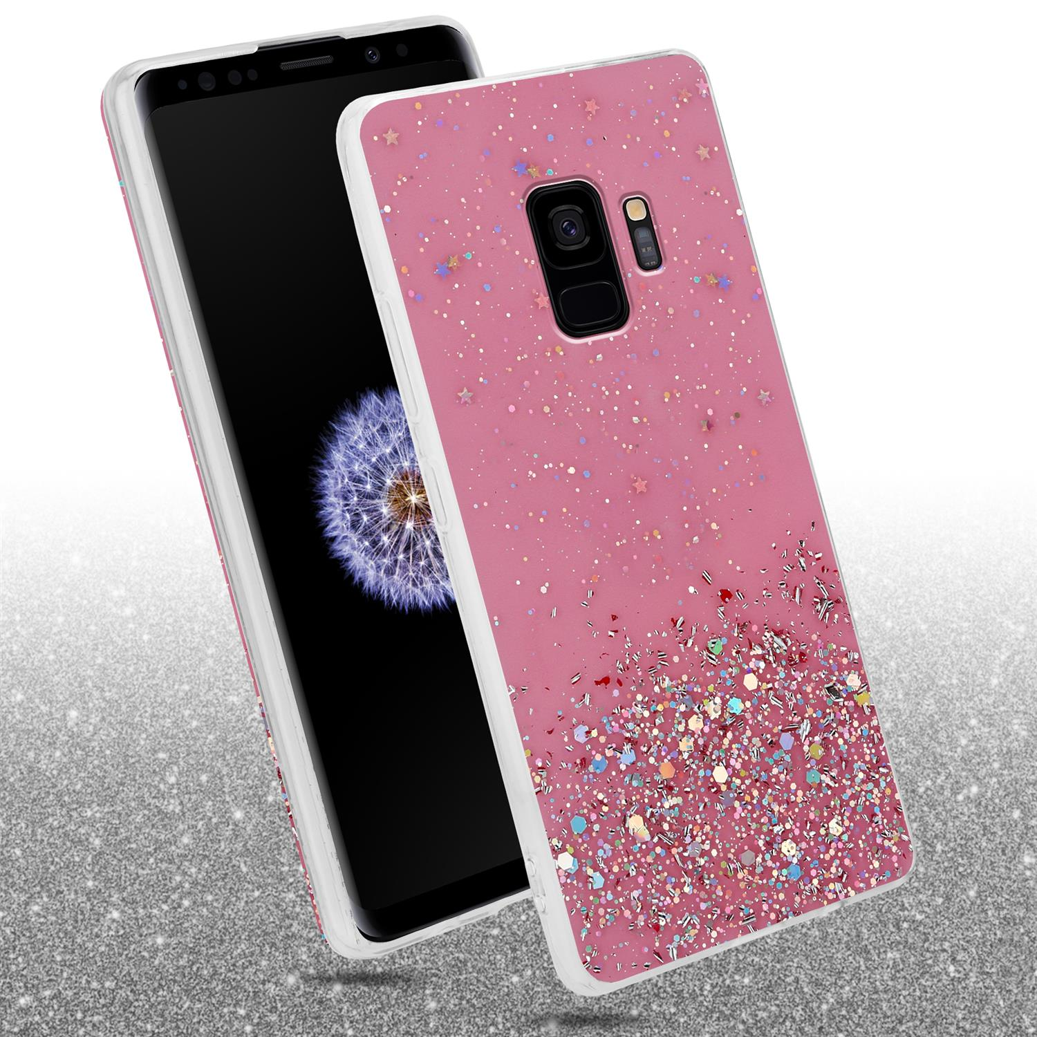 Rosa Handyhülle mit Glitzer und ein Telefon darin. Das Telefon zeigt einen Bildschirm und eine weiße Hülle.