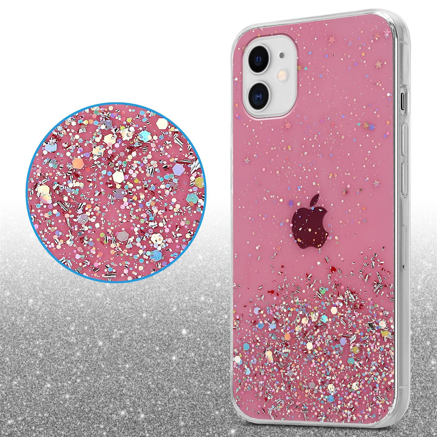 Eine Handyhülle mit rosa Glitzer und rosa Hintergrund. Die Hülle hat ein schwarzes Apfel-Logo.